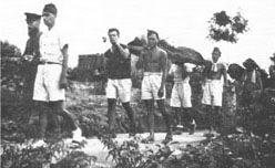 Australians and Dutch participate in a funeral